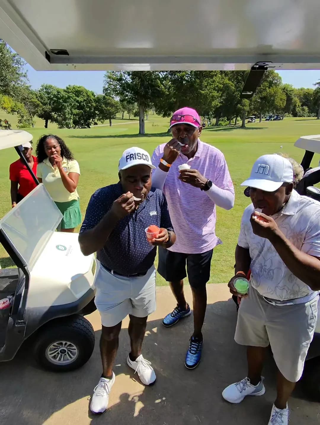 A group of golfers enjoying Iced Out water ice at a Parrish Charitable Foundation event
