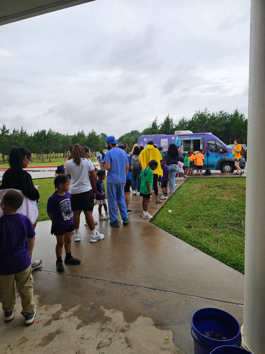 Line of guests at the Iced Out Philly water ice truck at Glenn Heights Heritage Park festival